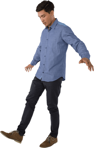Man in transparent pose examining shoes in relaxed attitude