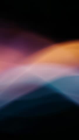 Vertical looping abstract waves flowing orange to blue into purple on dark backdrop