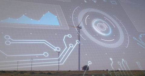 Towering wind turbine rotating with futuristic hud overlays for energy analytics