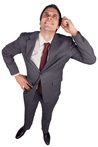 image features a confident caucasian businessman standing with a pleasant expression, looking up. dressed in a gray suit with a red tie, he exudes confidence and professionalism. isolated on a transparent background for easy integration into various projects. useful for illustrating concepts such as corporate success, ambition, positive outlook, or business strategies in presentations, marketing materials, or web design.