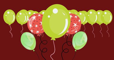 Colorful Balloons Floating Against Red Background
