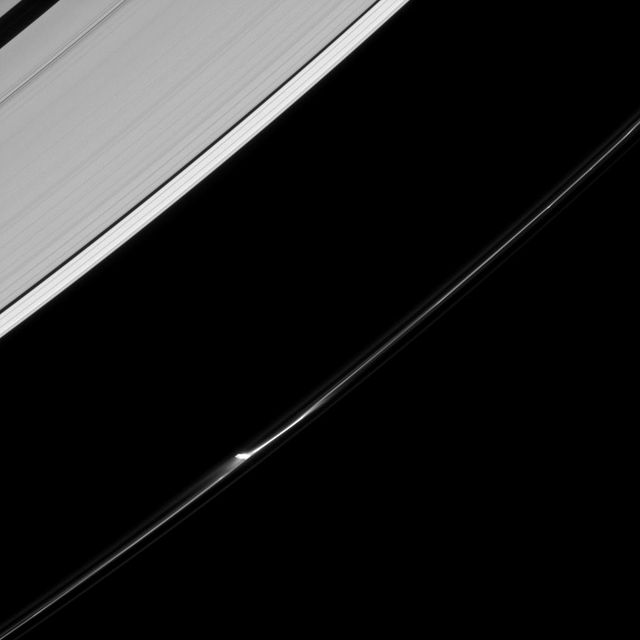 A single jet feature appears to leap from the F ring of Saturn in this image from NASA Cassini spacecraft. A closer inspection suggests that in reality there are a few smaller jets that make up this feature.