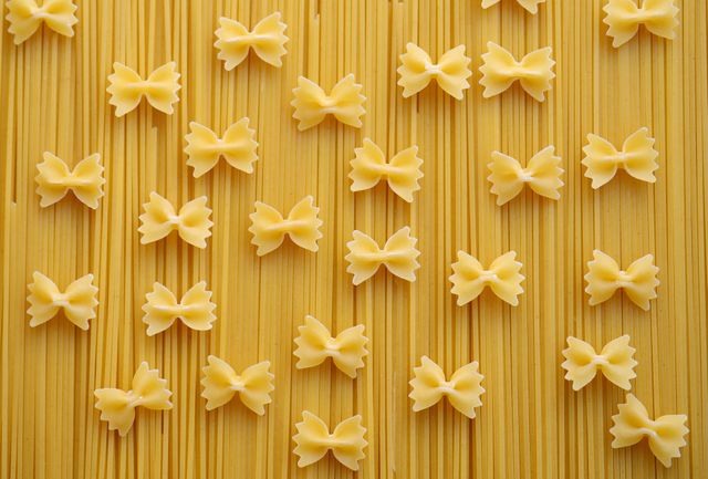 Perfect for culinary blogs, Italian restaurant menus, or food packaging design. Highlights different pasta shapes for creative and authentic presentations.
