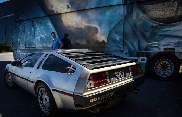 DeLorean DMC-12 parked at NASA's Goddard Space Flight Center in Greenbelt, Maryland, on October 21, 2015, coinciding with the date depicted in 'Back to the Future Part II'. Great for articles on car culture, events celebrating pop culture anniversaries, and stories related to NASA or vintage cars. Perfect for illustrating themes of nostalgia and iconic movie references.