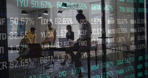 Successful Professionals Collaborate on Business Strategy in Modern Office