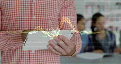 Teacher utilizes tablet for interactive data visualization in classroom