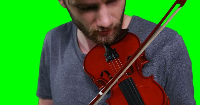 Young Man Playing Violin Isolated on Green Screen Background - Download Free Stock Images Pikwizard.com