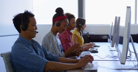 Diverse Call Center Operators Using Headsets in Modern Office - Download Free Stock Images Pikwizard.com