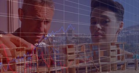 Diverse architects analyzing statistical data for design