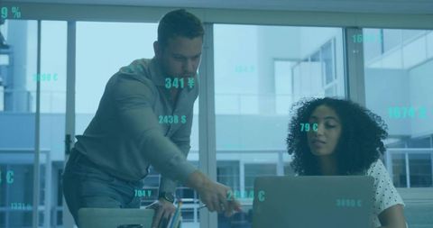 Teamwork Boosts Financial Analysis with Technology in Modern Office