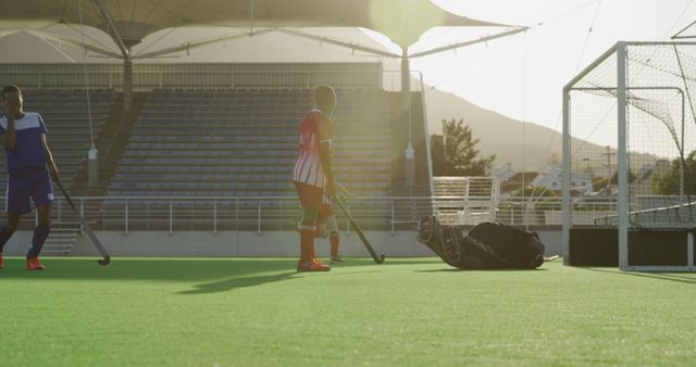 Field Hockey Players Practicing on Sunny Day - Download Free Stock Images Pikwizard.com