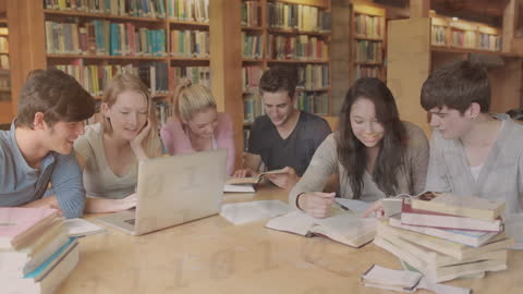 Multiracial Students Collaborating in Library Enhanced with Digital Coding