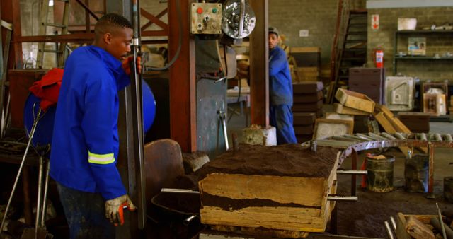 Workers Operating Machinery in Metal Workshop - Download Free Stock Images Pikwizard.com