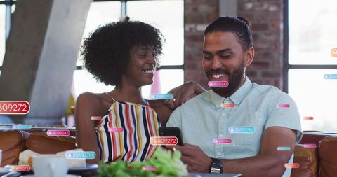 Happy Couple Engaging with Social Media Concept