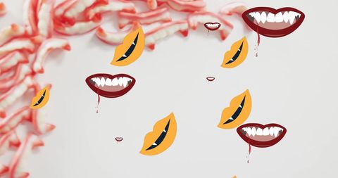 Vampire Mouths Flying Over Halloween Candy