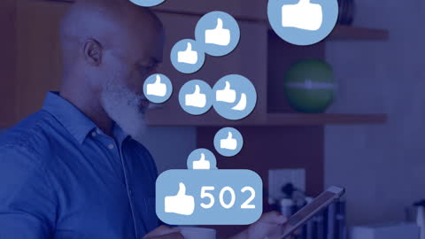 Senior Man Interacting with Social Media on Tablet