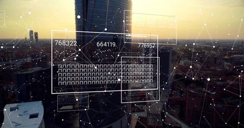 Futuristic data processing simulation over modern city skyline
