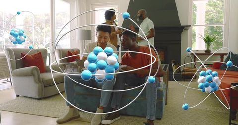 Studying with tablet and augmented reality molecular models in sunlit living room