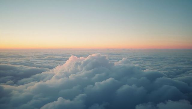 Ethereal Skyscape with Sunlit Clouds and Pastel Horizon