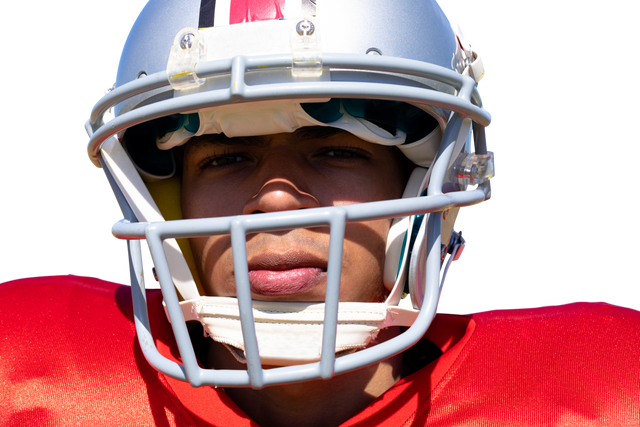 Focused Biracial American Football Player with Helmet on Transparent Background - Download Free Stock Videos Pikwizard.com