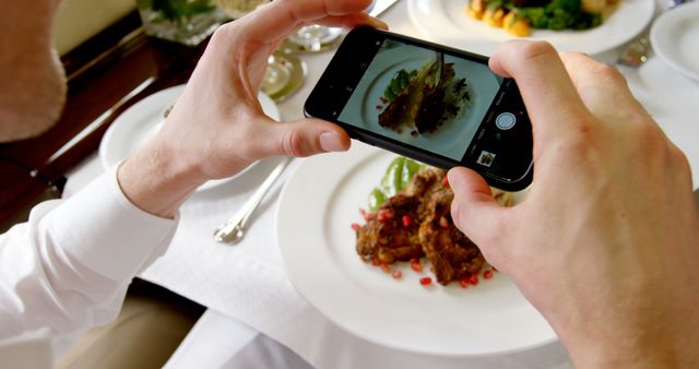 Person Taking Photo of Gourmet Meal with Smartphone in Restaurant - Download Free Stock Images Pikwizard.com