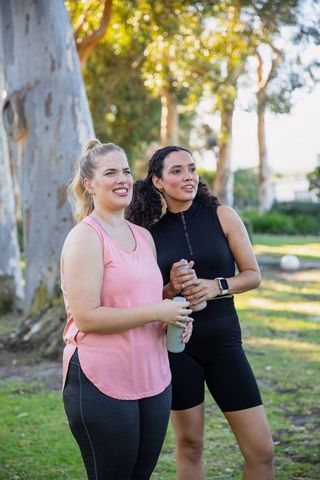 Diverse Friends Enjoying Outdoor Fitness and Hydration