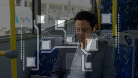 Man Engaging in Digital Technology with Data Interface on Public Transport