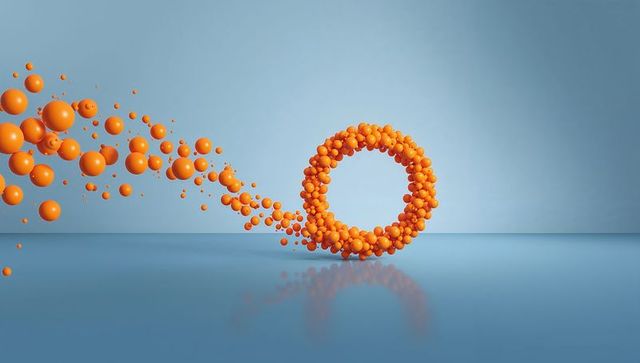Orange sphere torus flowing across glossy blue surface with reflective minimal background