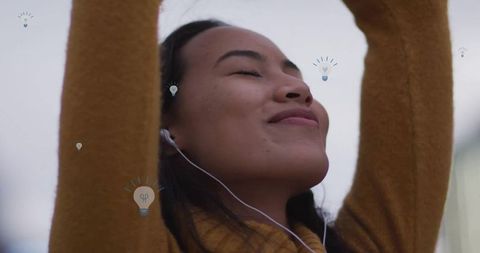 Happy woman listening music with creative ideas energy