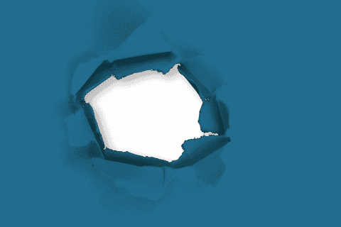 abstract torn hole in blue background on transparent surface - Download Free Stock Videos Pikwizard.com
