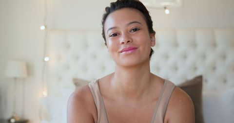 Modern Bedroom Lighting and Decor with Relaxed Woman