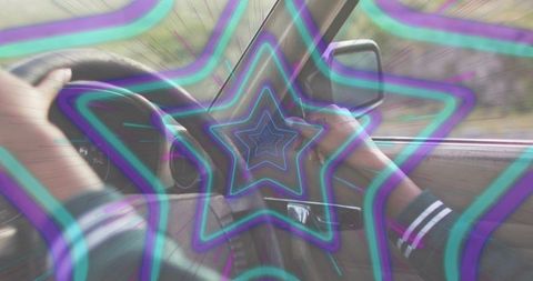 Female driver gripping steering wheel while driving with psychedelic star overlay