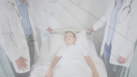 Doctors with Young Patient in Hospital showing Digital Network Concept