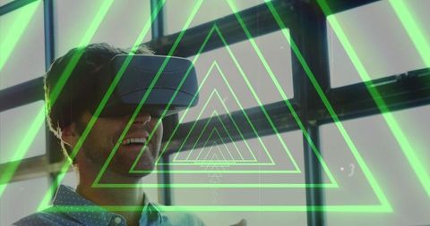 Man Experiencing Virtual Reality Through Neon Tunnel