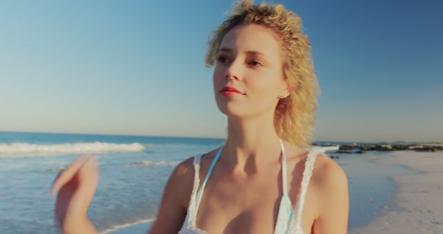 Young Blond Woman Enjoying Sunny Day on Beach - Download Free Stock Images Pikwizard.com