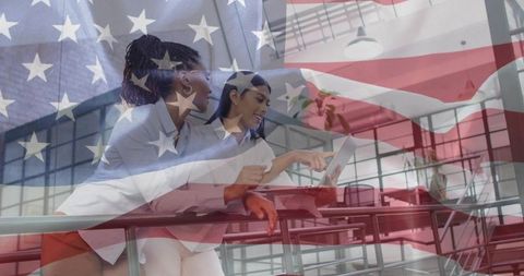 Teamwork in Modern Office with United States Flag Overlay