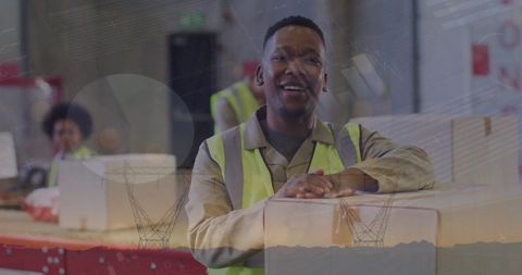Smiling Worker in Warehouse with Overlayed Statistic Charts - Download Free Stock Images Pikwizard.com