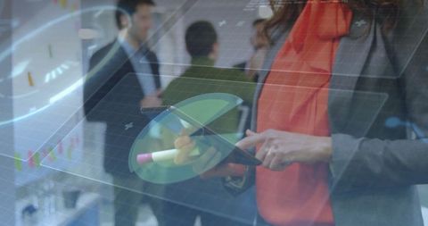 Businesswoman in Office Environment Using Technology with Holographic Charts