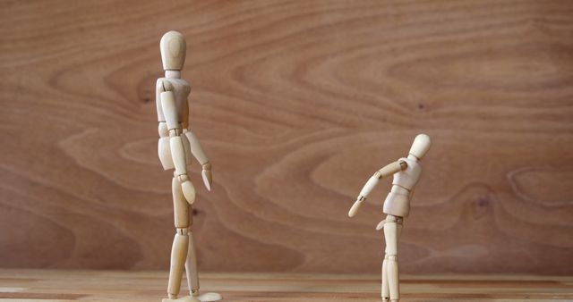 Wooden Art Mannequins Standing on Wooden Surface - Download Free Stock Images Pikwizard.com