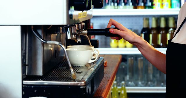 Barista making coffee at a cafe espresso machine - Download Free Stock Images Pikwizard.com