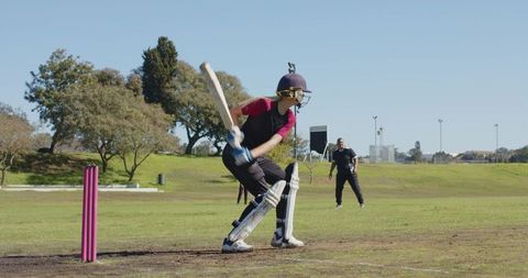 Female Cricketers Sharpening Skills and Team Dynamics on Bright Field