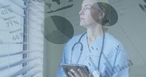 Clinician analyzing digital health data in modern clinic