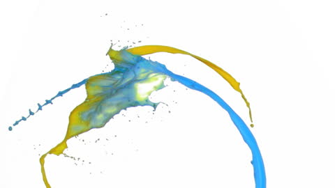 Dynamic Splash of Yellow and Blue Paint Creating Contrast