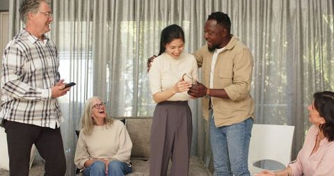 Diverse Group Celebrating in Collaborative Therapy Session