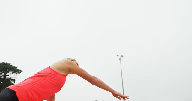 Athletic Woman Preparing for Outdoor Training Session - Download Free Stock Images Pikwizard.com