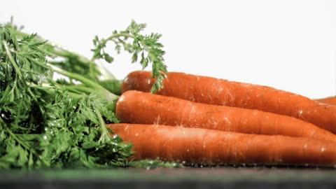 Freshly Washed Carrots with Water Droplets