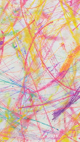 Vertical video panning over vibrant abstract scribble painting with neon color strokes