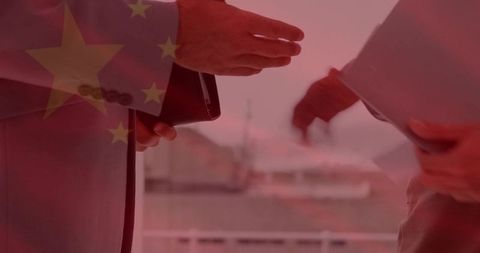 Negotiating under chinese flag overlay, hands exchanging documents and wallet