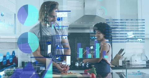 Mixed Race Couple Cooking with Technology in Modern Kitchen