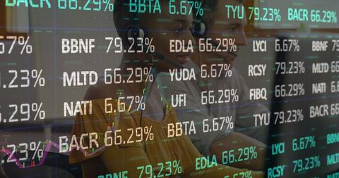 Financial Analysts Handling Global Data on Trading Screens